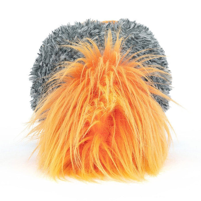 Back of a comet plush showing its orange and gray fur