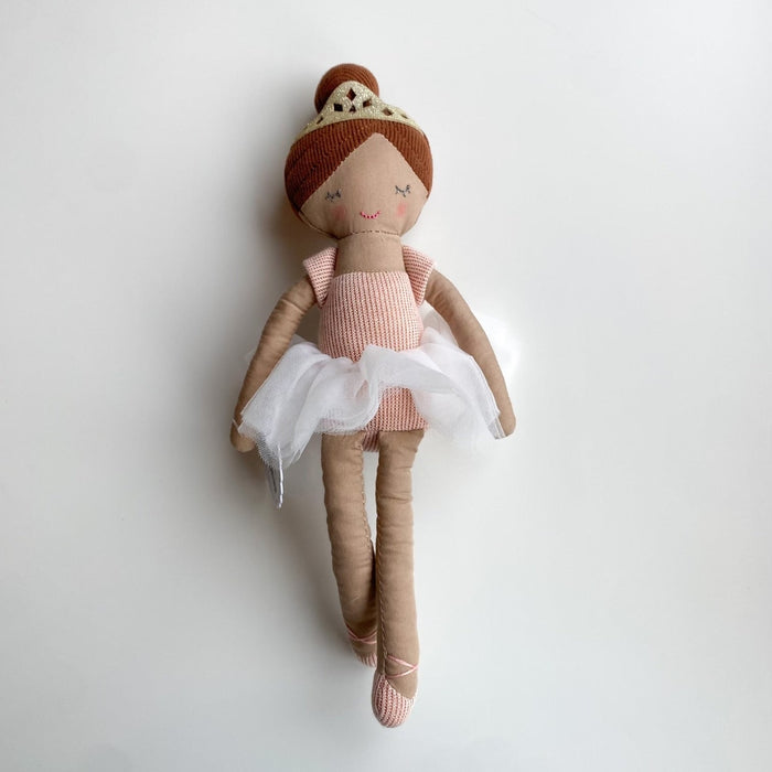 Fabric ballerina doll with brown hair wearing a gold crown and white tulle tutu