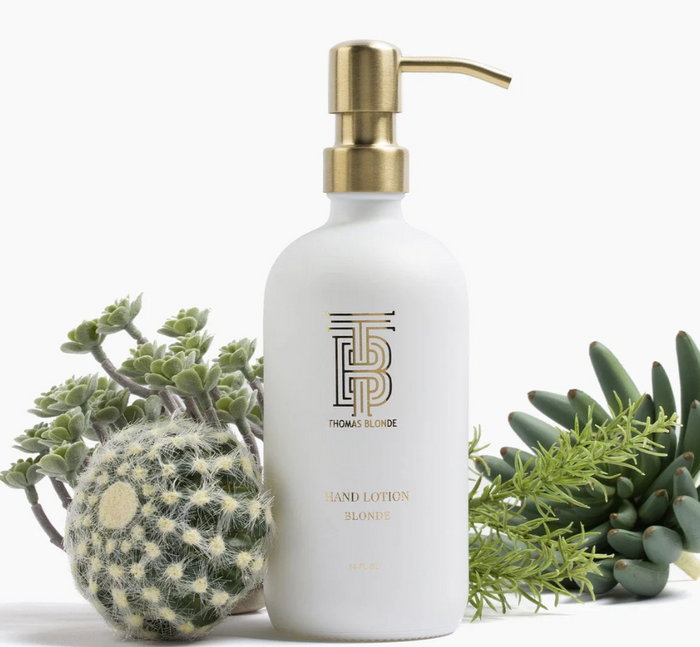 Thomas Blonde Signature lotion in a white pump bottle
