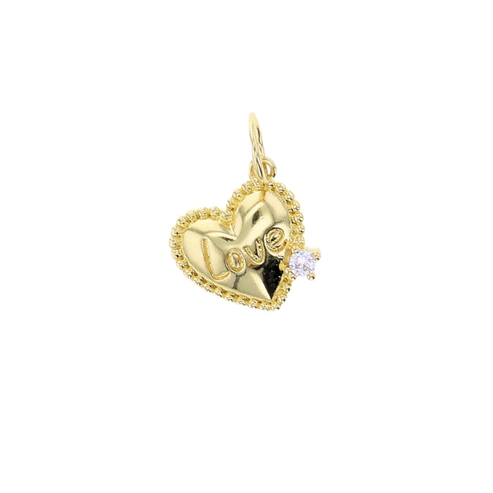 Small gold heart charm with a crystal star accent