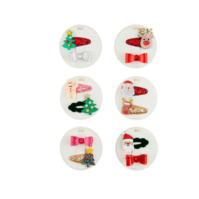 Set of six Christmas themed hair clips featuring Santa, reindeer, gingerbread man, and tree designs