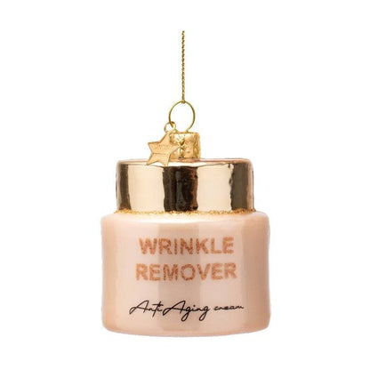 Glass Christmas ornament shaped like a jar of wrinkle remover cream