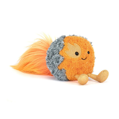 Orange and gray fluffy comet plush lying down