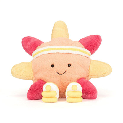 Plush star toy wearing a yellow and white headband and white sneakers