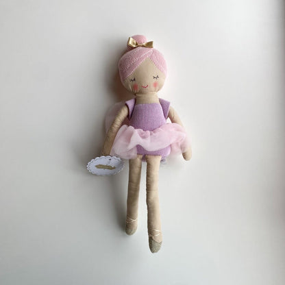 Plush ballerina doll with pink hair and tutu