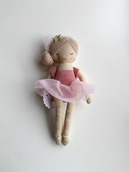 Fabric ballerina doll with a pink tutu and gold star hair accessory