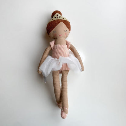 Fabric ballerina doll with brown hair wearing a gold crown and white tulle tutu
