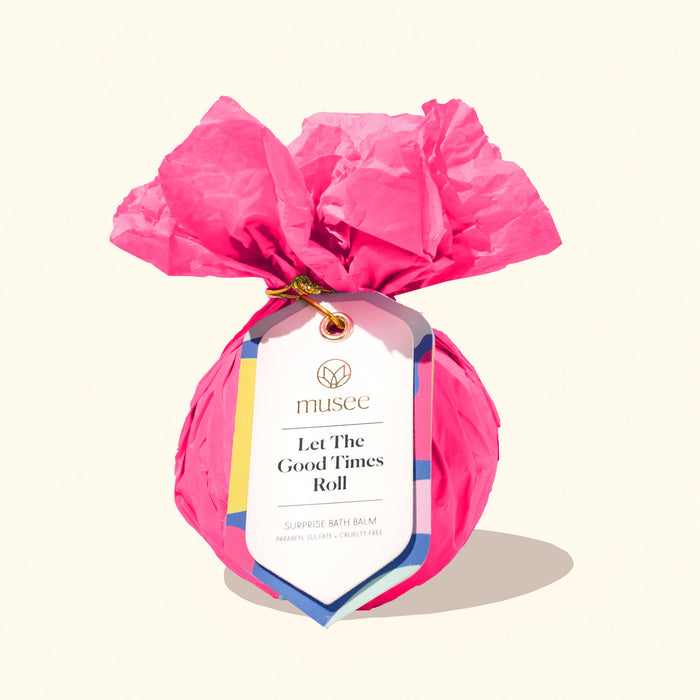 Musee Let the Good Times Roll bath balm wrapped in pink tissue