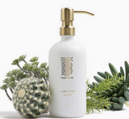 Thomas Blonde Signature lotion in a white pump bottle