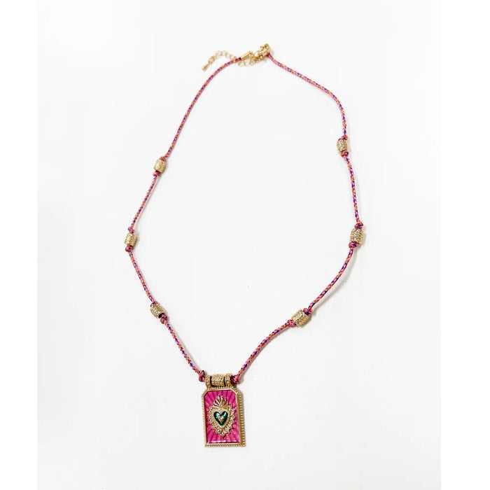 Pink beaded cord necklace with a pink enamel heart pendant
