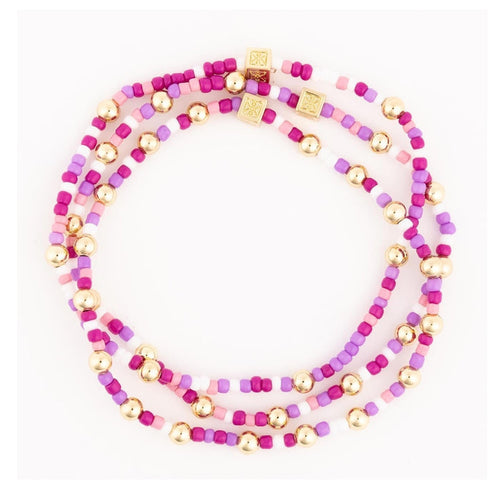 Set of purple, pink and gold seed bead stretch bracelets