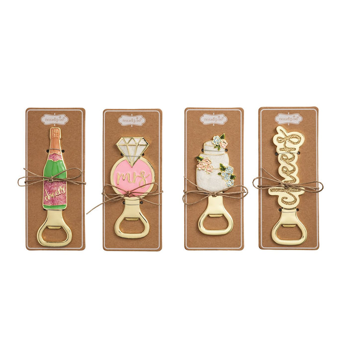 Four metal bottle openers shaped like a champagne bottle, engagement ring, wedding cake, and the word cheers
