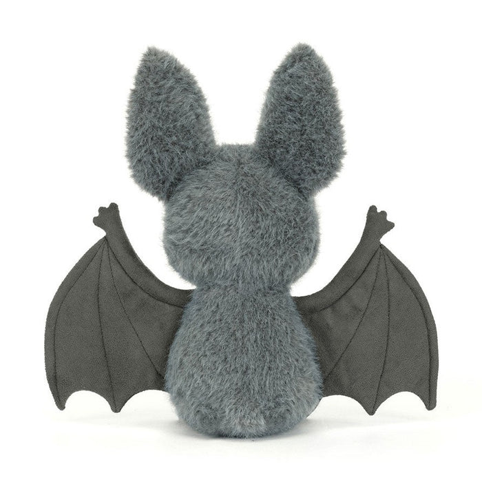 Back of a gray bat plush with spread wings