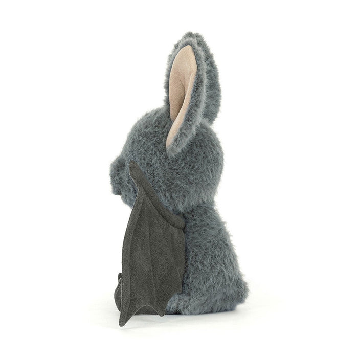 Gray bat plush seen from the side