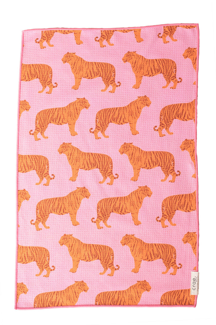 Pink hand towel with an orange tiger print