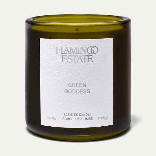 Flamingo Estate Green Goddess candle in a green glass vessel