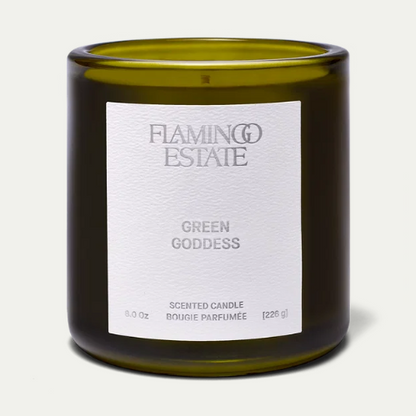 Flamingo Estate Green Goddess candle in a green glass vessel