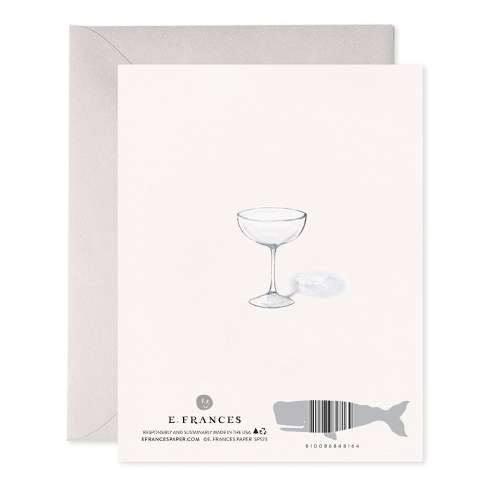 Back of a card with a champagne coupe illustration