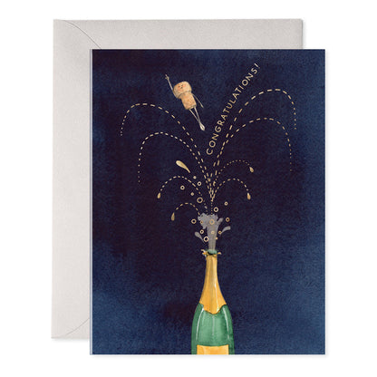 Navy card with a champagne bottle popping its cork