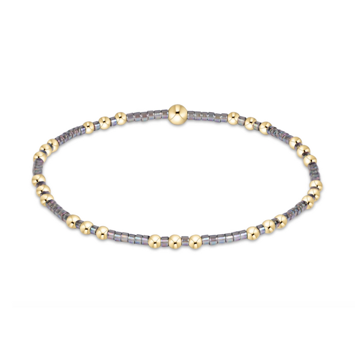 Gold beaded stretch bracelet with gray seed bead sections