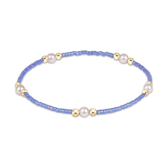 Periwinkle seed bead stretch bracelet with pearl and gold bead clusters