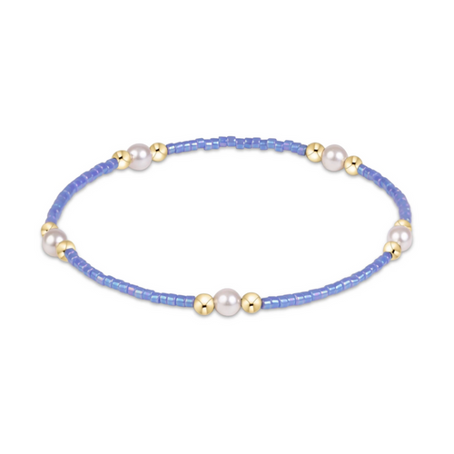Periwinkle seed bead stretch bracelet with pearl and gold bead clusters