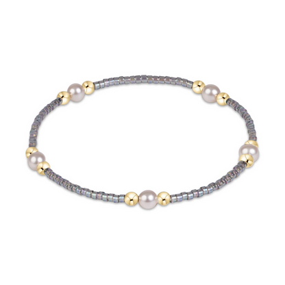 Gray seed bead stretch bracelet with pearl and gold bead clusters