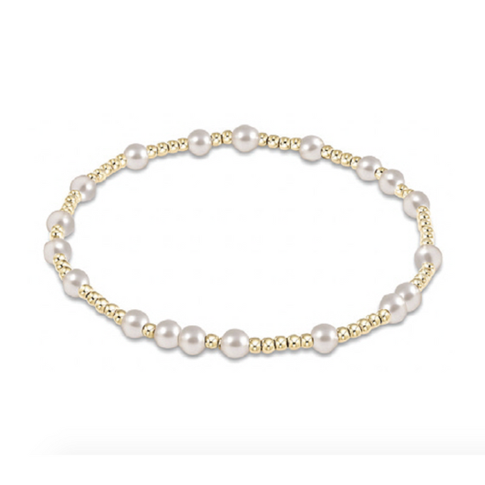 Gold beaded stretch bracelet with sections of white pearls