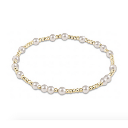 Gold beaded stretch bracelet with sections of white pearls