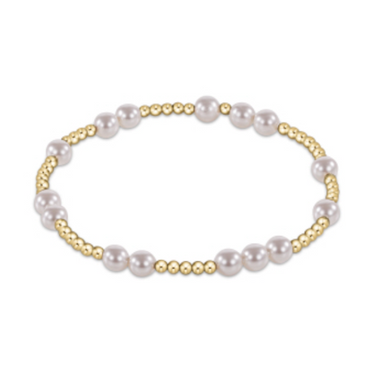Gold beaded stretch bracelet with clusters of larger white pearls