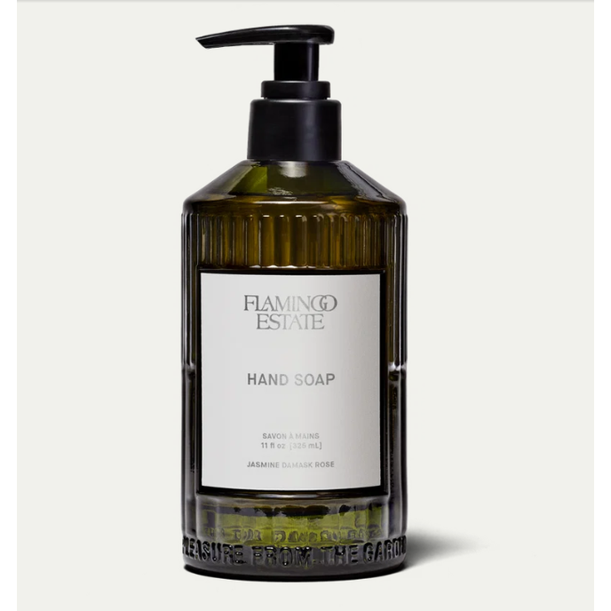 Flamingo Estate Jasmine Damask Rose hand soap in a dark glass pump bottle