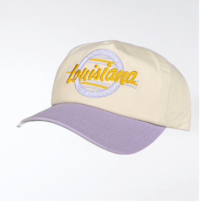 Cream baseball cap with a purple brim and embroidered Louisiana text in yellow