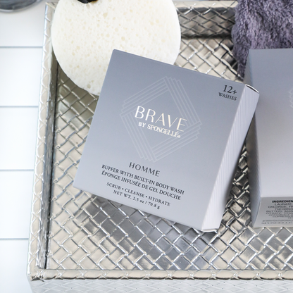 Brave by Spongelle Homme body wash buffer box on a silver woven tray