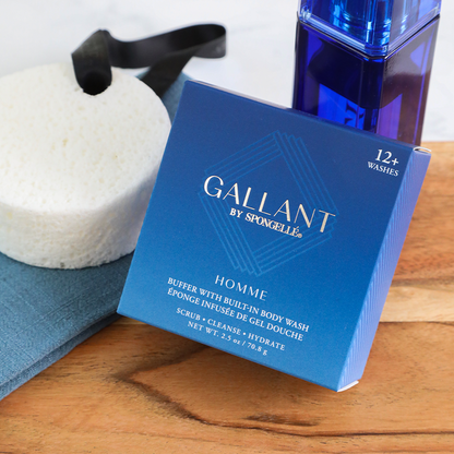 Gallant by Spongelle Homme body wash buffer box with white sponge and blue bottle on wooden surface