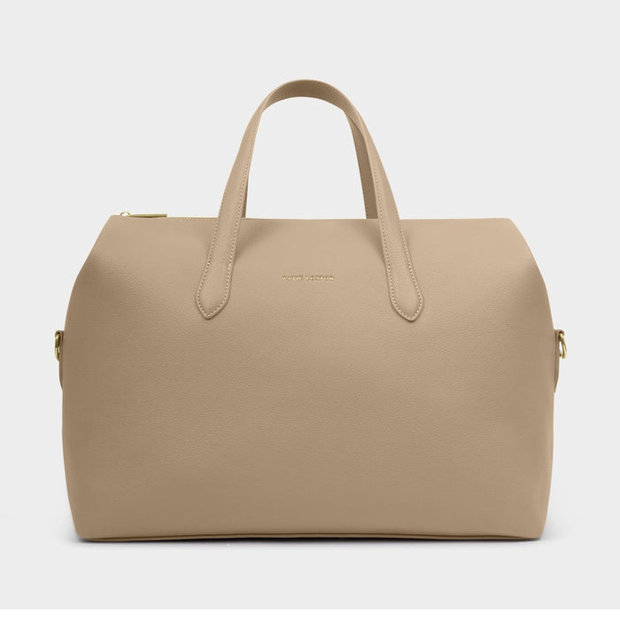 Beige faux leather weekend bag with top handles and gold hardware
