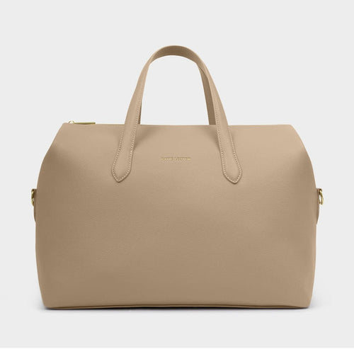 Beige faux leather weekend bag with top handles and gold hardware