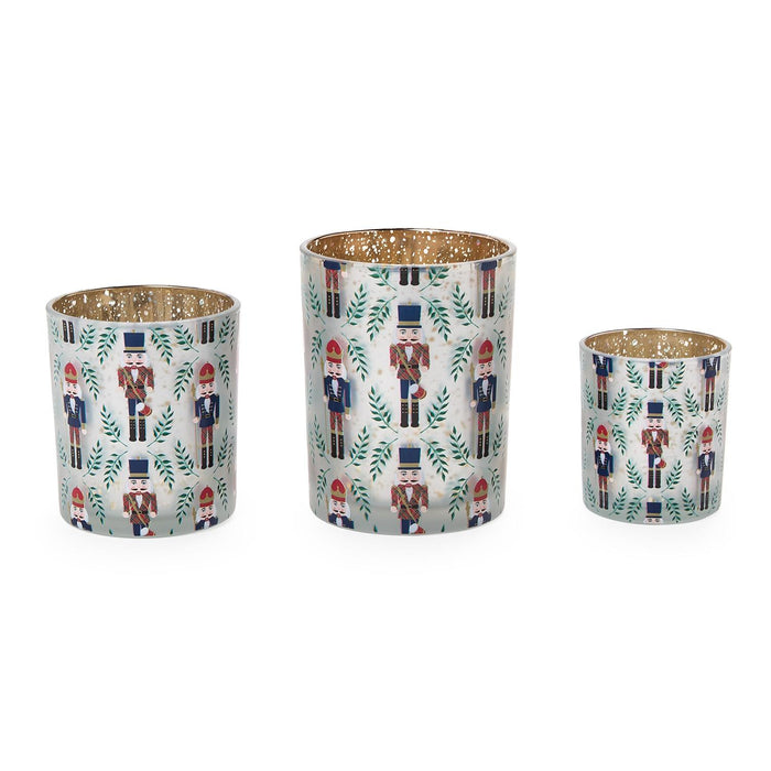 Set of three nutcracker tealight candleholders in graduated sizes