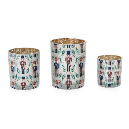 Set of three nutcracker tealight candleholders in graduated sizes