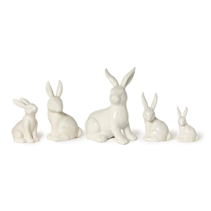 White porcelain bunny figures in a row