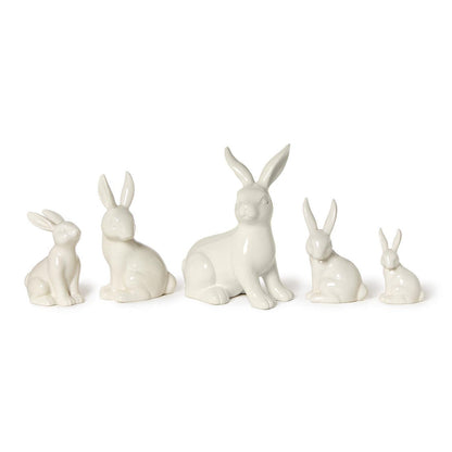 White porcelain bunny figures in a row