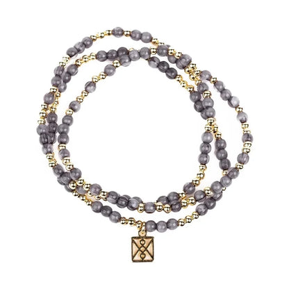 Gray and gold beaded wrap bracelet with a square charm