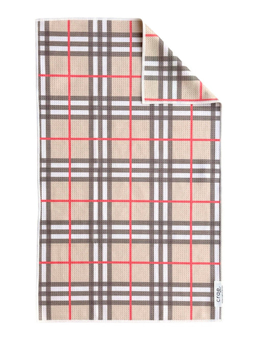 Hand towel with a pink, red and black plaid print