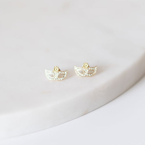 Gold masquerade mask stud earrings with small clear stones
