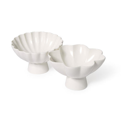 Two white ruffle-edged footed tidbit bowls
