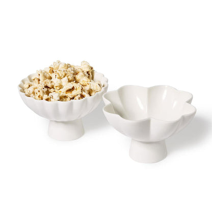 White ruffle tidbit bowls, one filled with popcorn