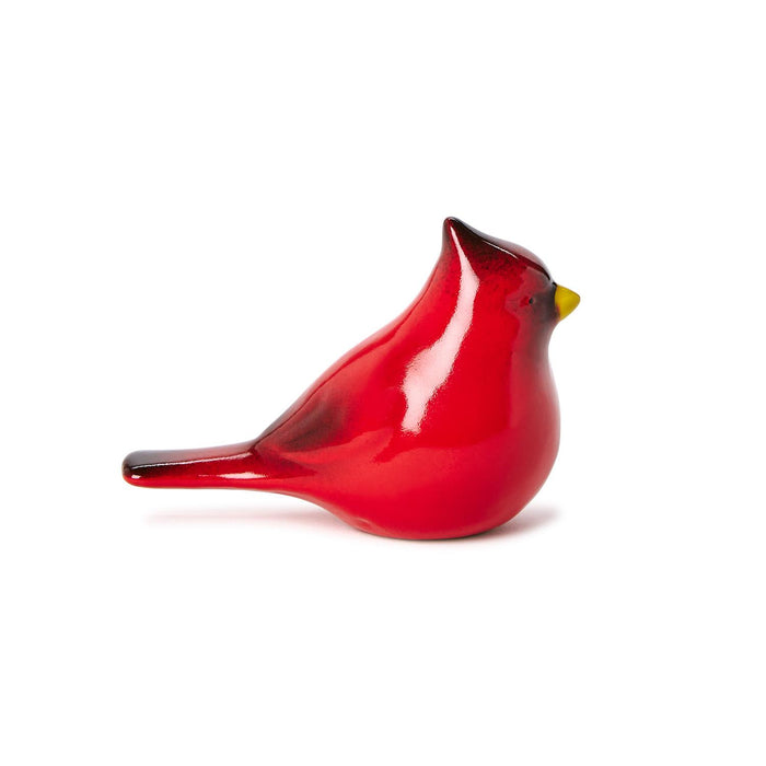 Red glass cardinal sculpture with a yellow beak