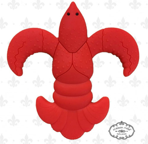 Red crawfish and fleur-de-lis shaped silicone teether