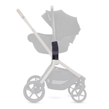 A side view diagram of a stroller highlighting a black car seat adapter attachment with the rest of the stroller faded out.