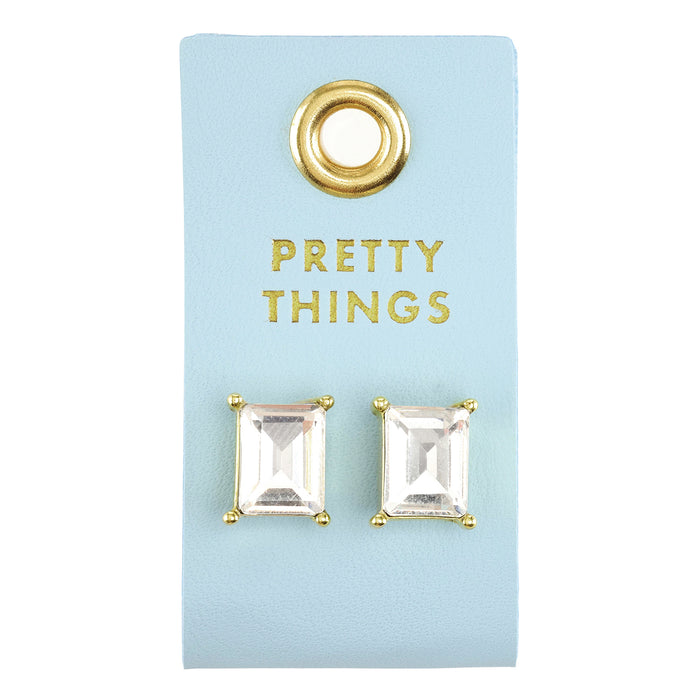 Rectangle crystal stud earrings on a light blue Pretty Things card