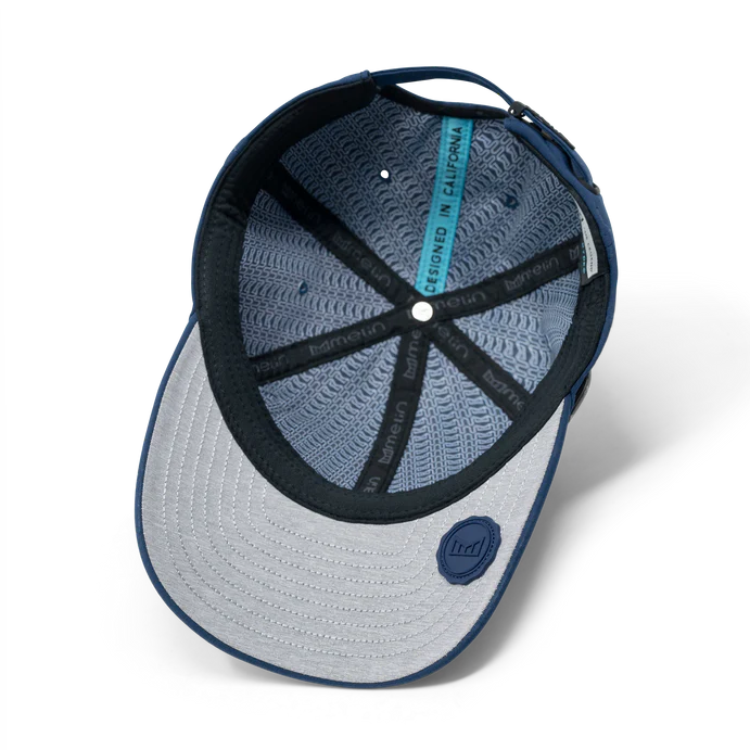 Underside of a navy melin cap with a gray brim